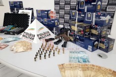 PM apreende arma, dinheiro e produtos, quebrando assim casa de jogatina no bairro Major Lage em Itabira